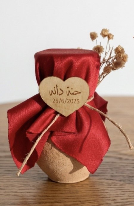 جرة مع اسم مغلفة ستان