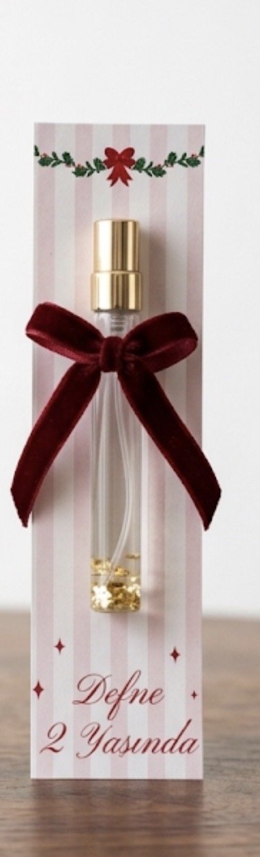 عطر مع بطاقة وببيون